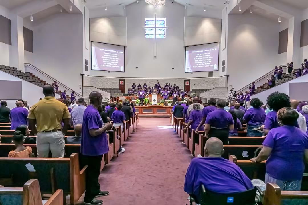 Williams Cathedral congregation worshipping together in the sanctuary
